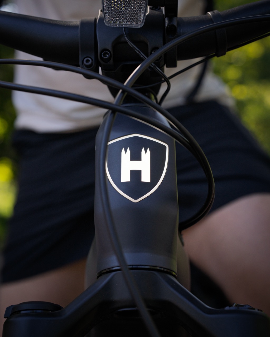 Helkama e-bike — shield emblem detail